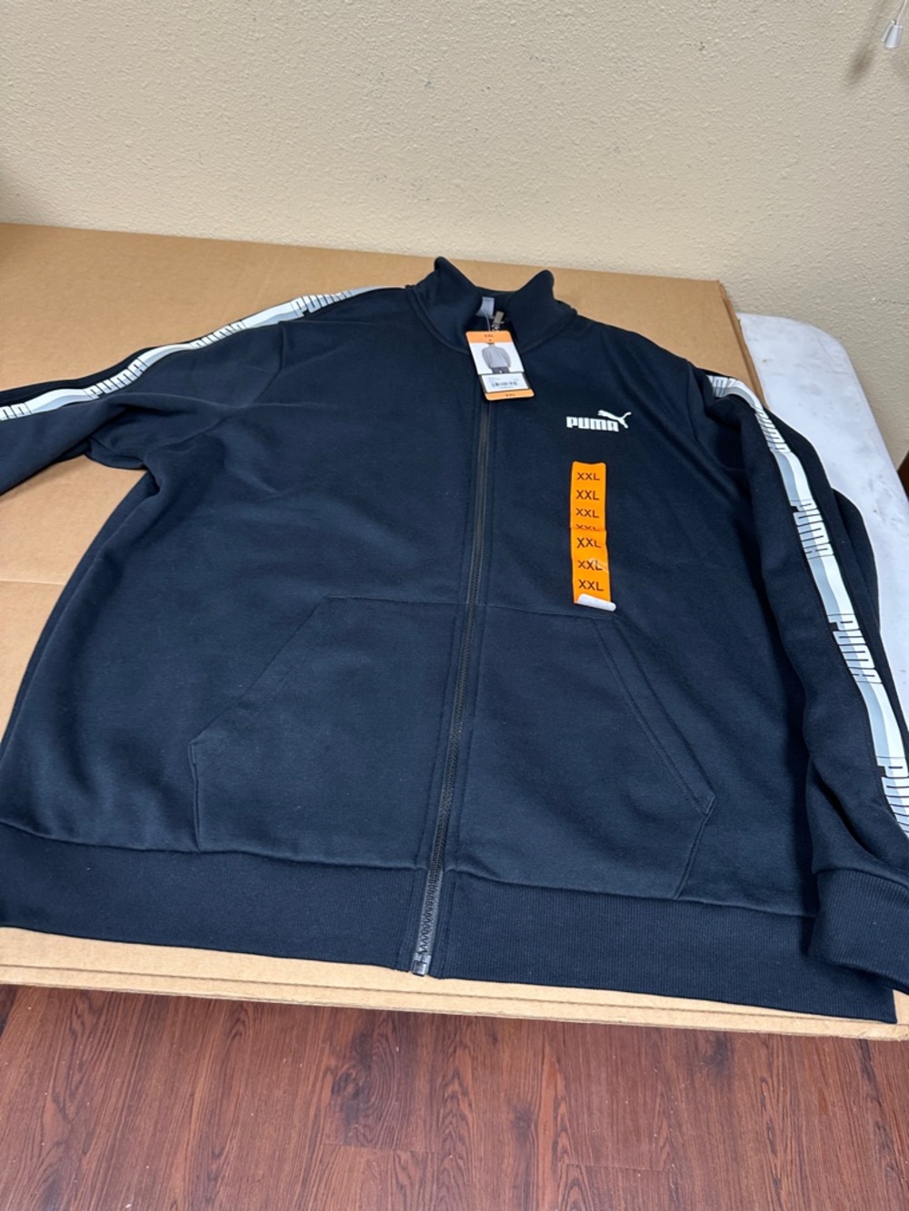 #158, NWT Puma Black Track Jacket with White Stripe Detail